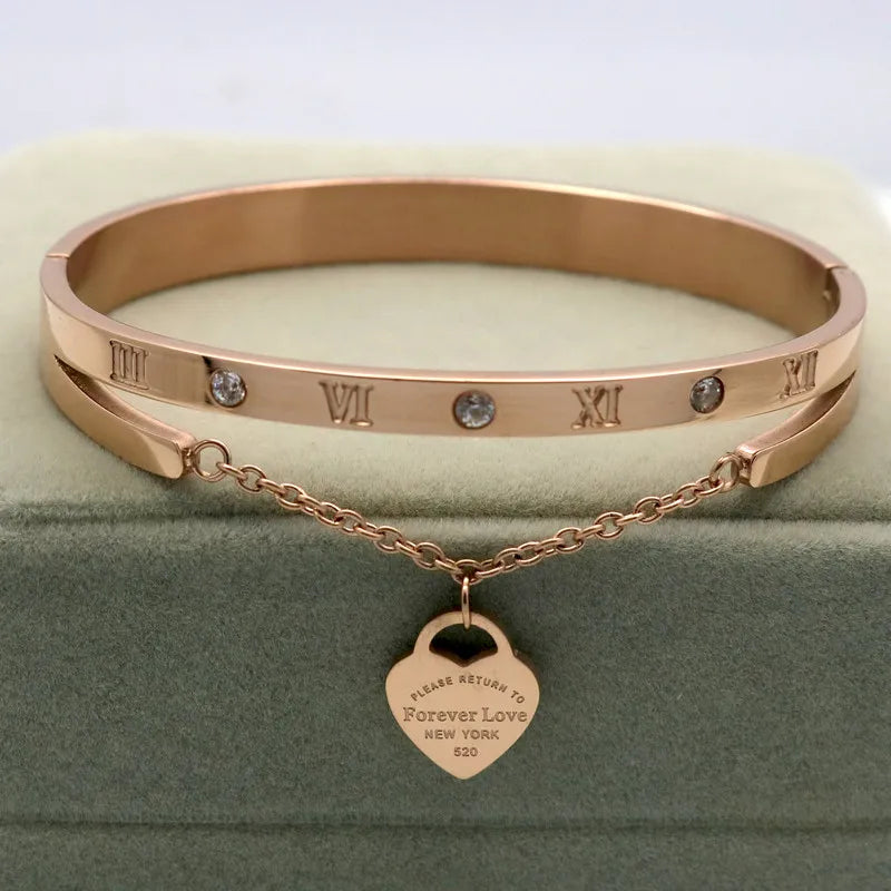 Stainless steel bracelet with love forever heart pendant