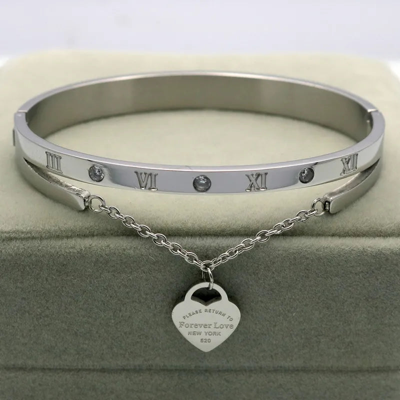 Stainless steel bracelet with love forever heart pendant