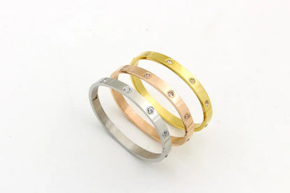 Beautiful stainless steel bracelets set with cubic zirconias in shades of gold, rose gold and silver