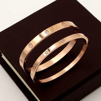 Beautiful stainless steel bracelets set with cubic zirconias in shades of gold, rose gold and silver